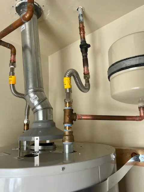 Water heater installation and plumbing repair in Country Club Estates